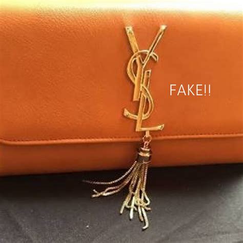 how to spot fake ysl crossbody|how to spot a ysl bag.